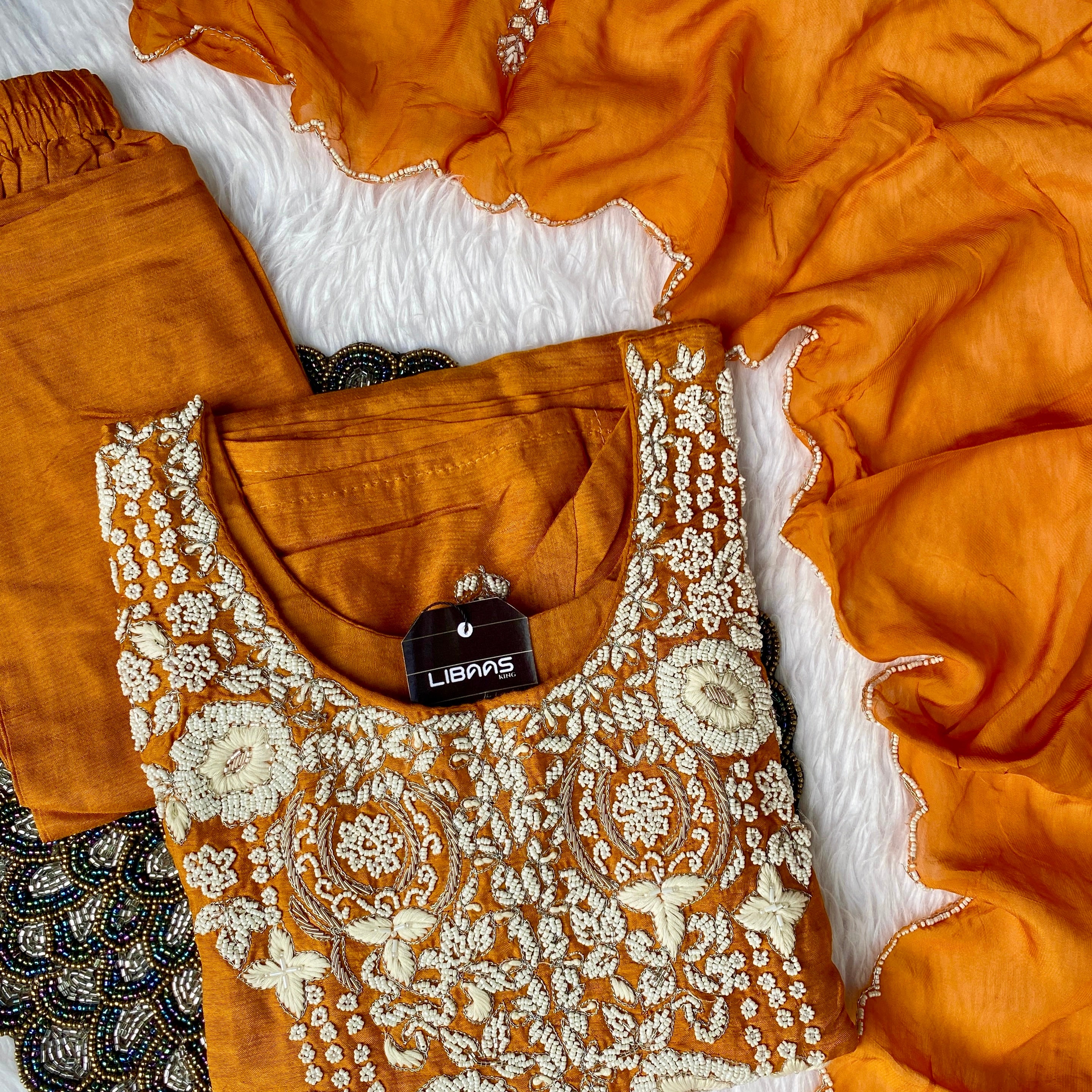 “ SUHANA” A very beautiful festival wear special rust orange set