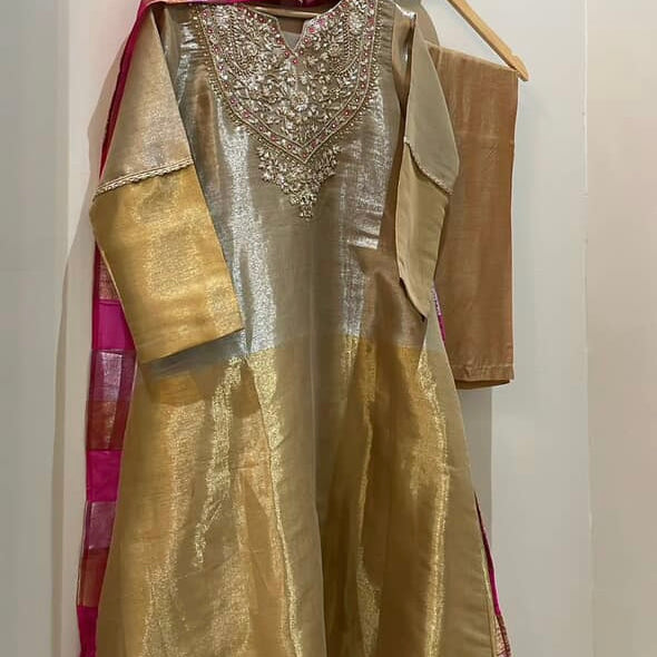 “VANSHIKA” ✨ Glow like gold A-line shimmer tissue suit set