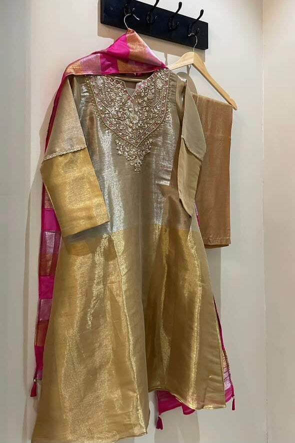 “VANSHIKA” ✨ Glow like gold A-line shimmer tissue suit set