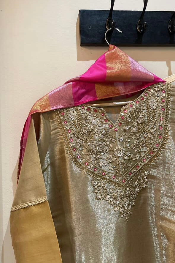 “VANSHIKA” ✨ Glow like gold A-line shimmer tissue suit set