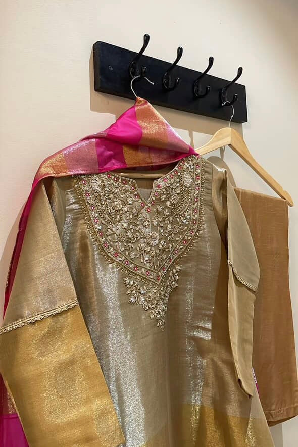 “VANSHIKA” ✨ Glow like gold A-line shimmer tissue suit set