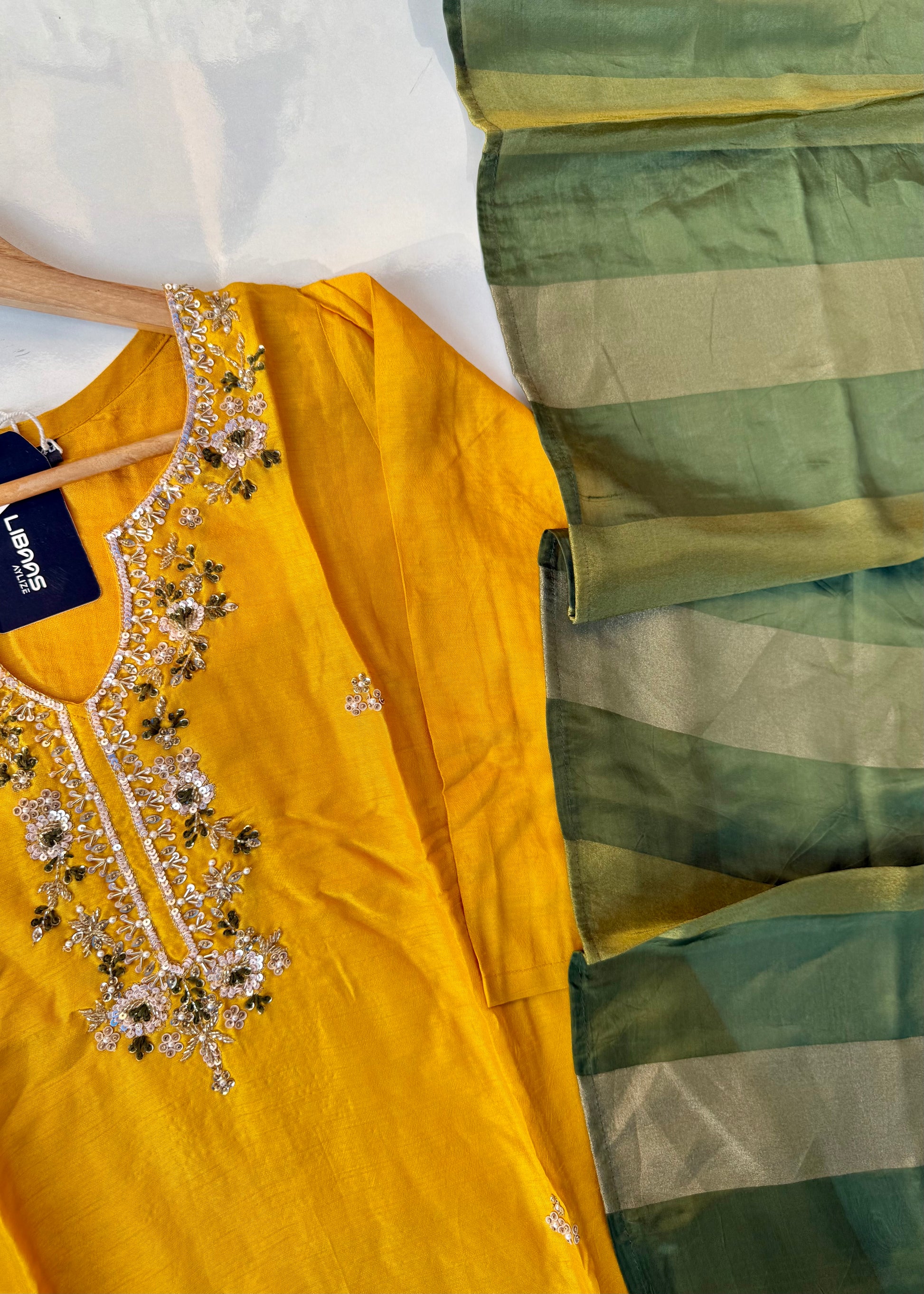 “AIRA” Mustard Yellow dola silk kurta with Green Striped Tissue Dupatta set