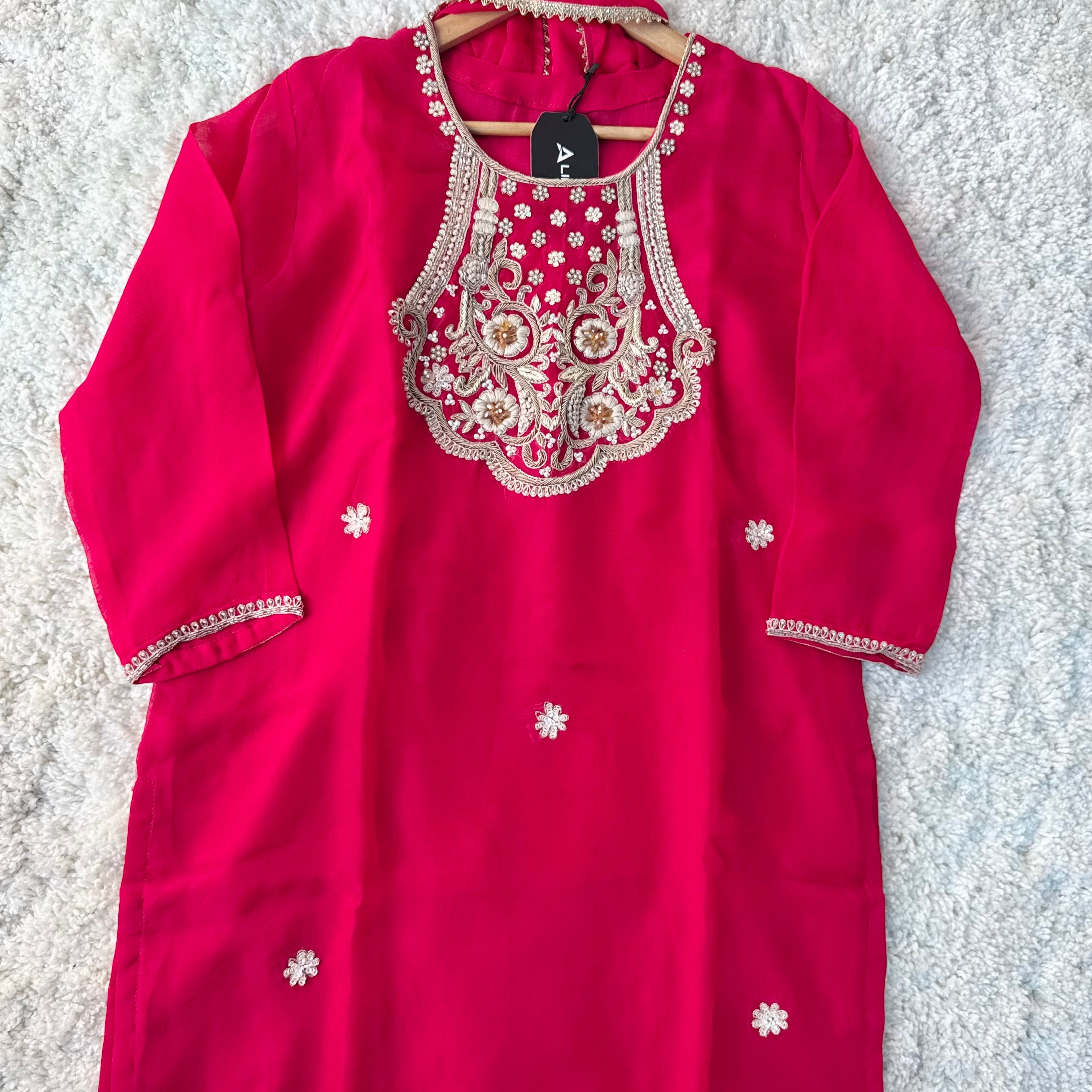 “Farah” party wear pink chinnon suit