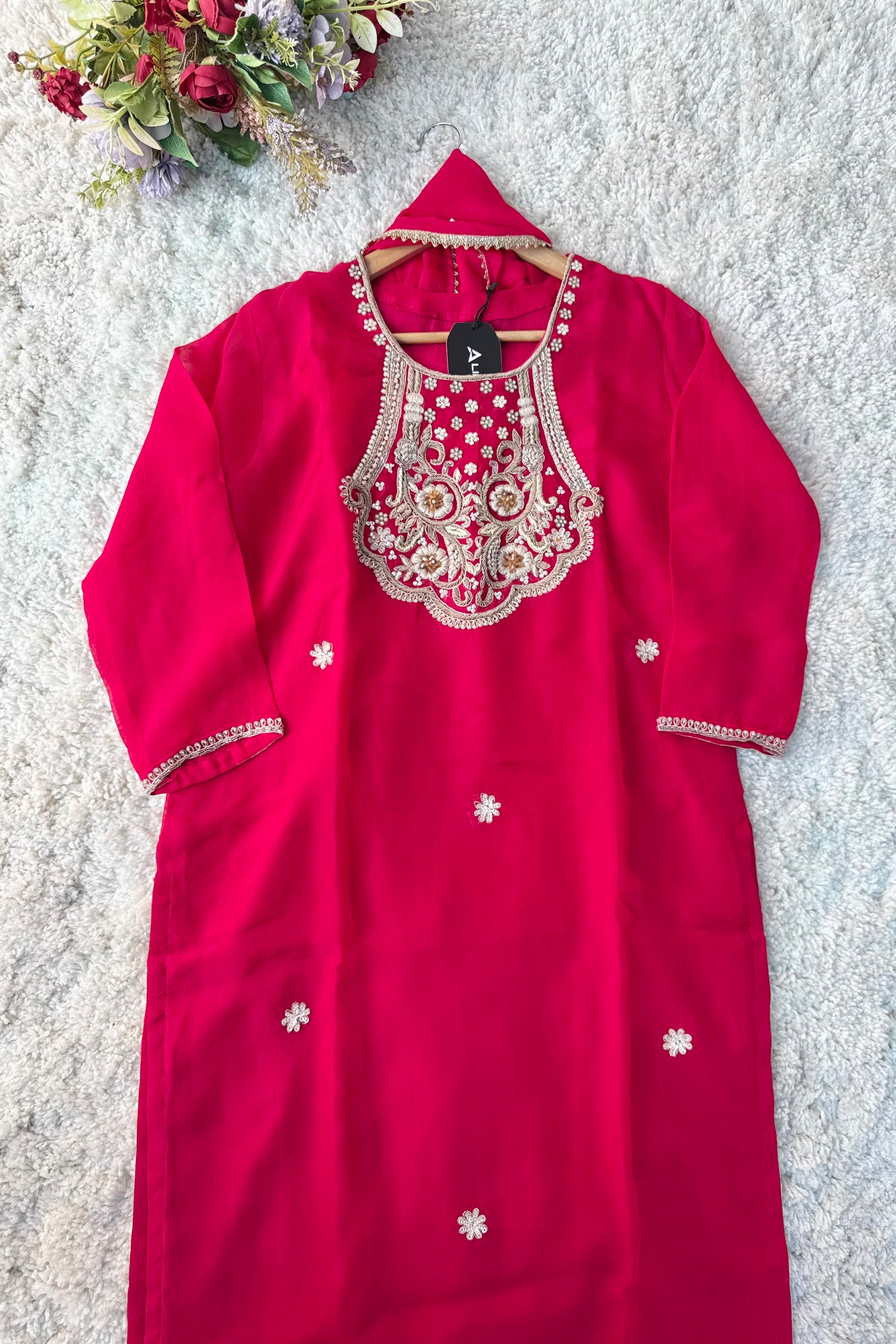 “Farah” party wear pink chinnon suit