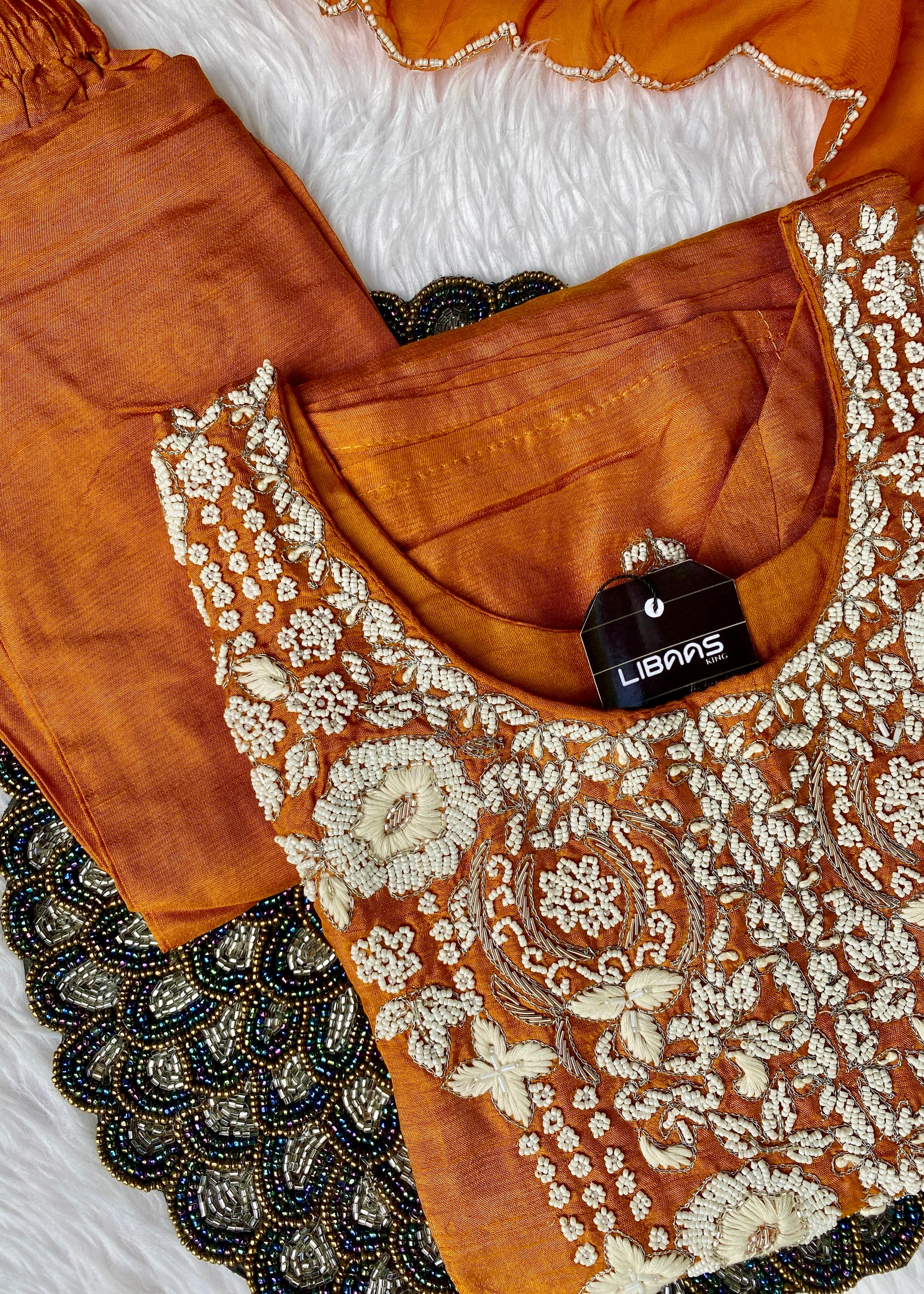 “ SUHANA” A very beautiful festival wear special rust orange set