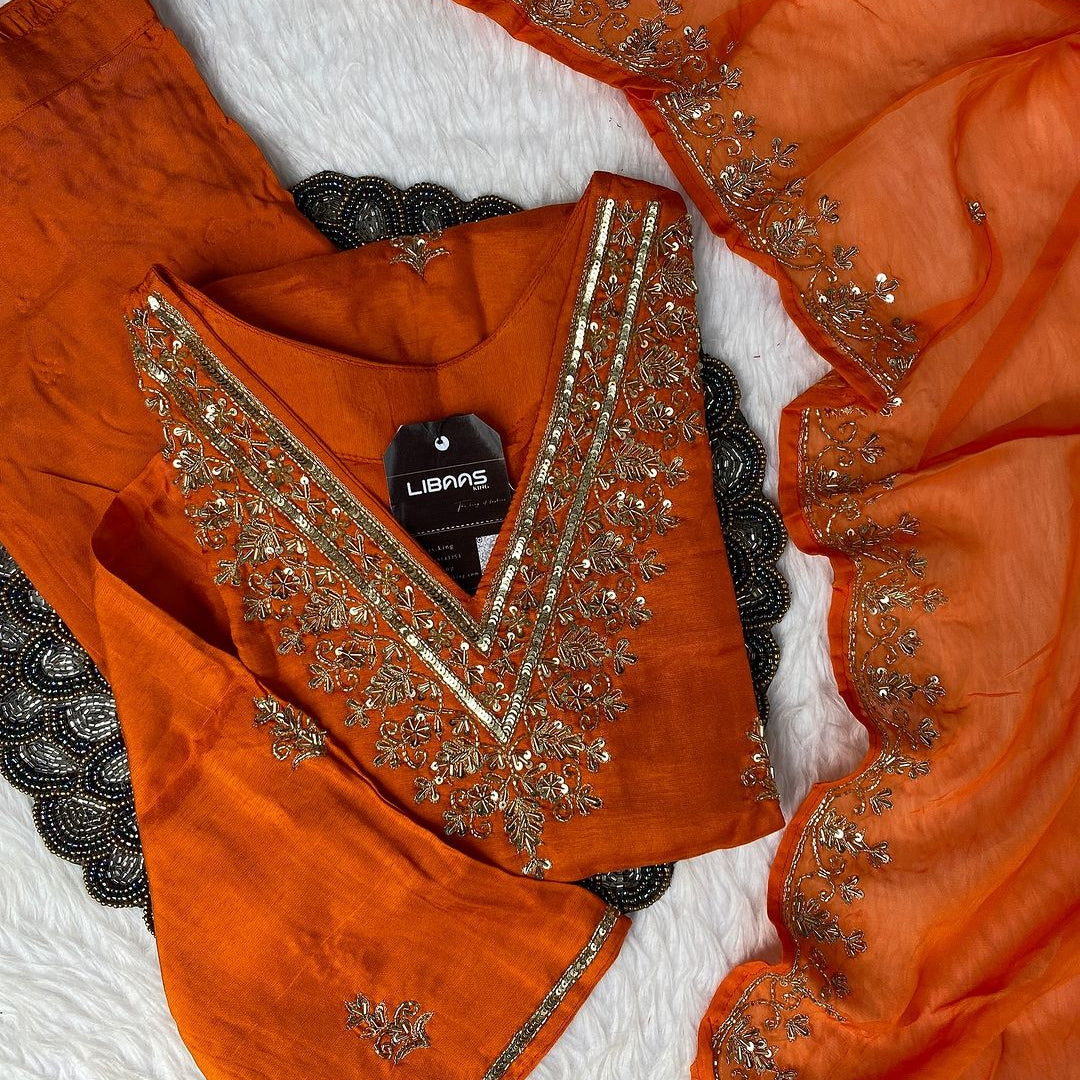 “Zeba” Orange shade Heavy handwork dola silk set